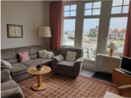 Appartement 3: Wohnzimmer mit Sitzgruppe 